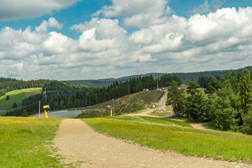 Mountain landscape with green meadows and forested hills in Slotwiny near Krynica Zdroj, Poland