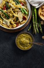 Vegetarian vegan green pasta, Fettuccine pasta with pesto sauce. Healthy food.