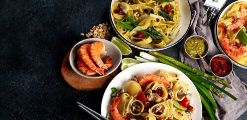 Italian dinner table with assortment of pastas.