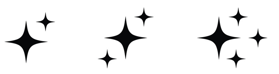 Obraz premium Black starburst sparkles on white background graphic elements shine glitter