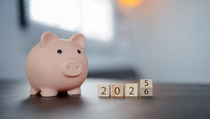 2025 end year to Happy New Year 2026 with piggy bank. Resolution, Goals, Plan, Action, Money Saving, Retirement fund, Pension, Investment and Financial concepts