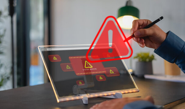 developer using computer laptop with triangle caution warning sign for notification error and maintenance concept. Computer virus detected, network security and maintenance concept.
 - Powered by Adobe