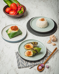 Delicious Indonesian Food Platter with Rice and Vegetables.