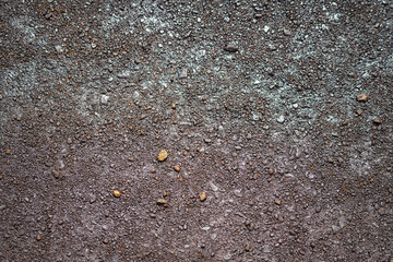 Dirt, terrain or gravel stone road surface pattern in outdoor environmental. Background and...