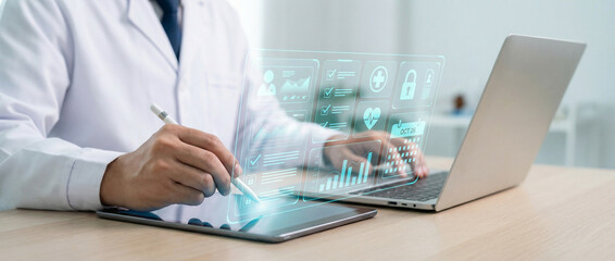 Doctor Using Tablet for Digital Patient Health Records and Telemedicine Data Analysis