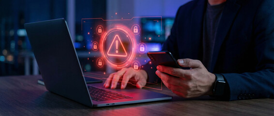 Cyber Security Breach Alert on Laptop and Smartphone Featuring Red Warning Icons and Locks