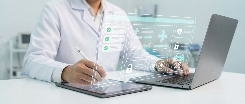 Doctor Managing Electronic Medical Records and Patient Dashboard on Digital Tablet and Laptop