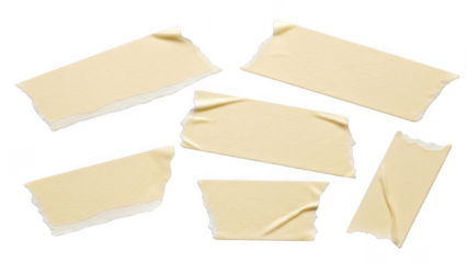 Scattered pieces of white tape on black background