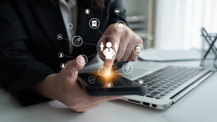 A concept of centralized business management and corporate strategy. A leadership team connecting...