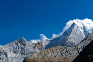 The last Shangri La, Yangmaiyong (or Jampayang in Tibetan) mountain peak in Yading, Daocheng County, Sichuan Province, China.