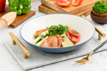 Healthy Salad with Fresh Vegetables and Salmon.