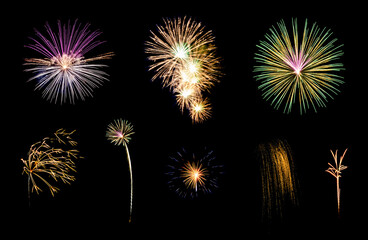 Variety of colorful fireworks isolated on black background