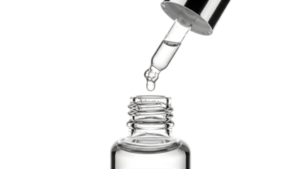Cosmetic serum dropper bottle with transparent liquid drops, high-key lighting