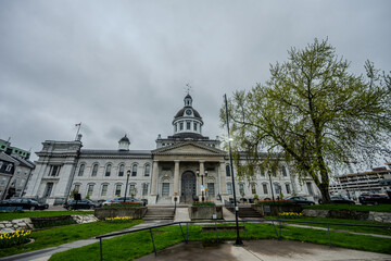 Fototapeta premium Historic Kingston City Hall with clock tower on a cloudy day