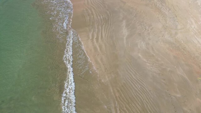 Sea Waves and Natural Coastal Beauty,A stunning Ariel shots capturing the blue waves of Karachi sea, showcasing the natural beauty and calmness of Pakistan&rsquo;s coastal region.
