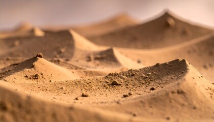 Close-up of undulating sand dunes, sculpted by wind, under a warm, hazy sky
