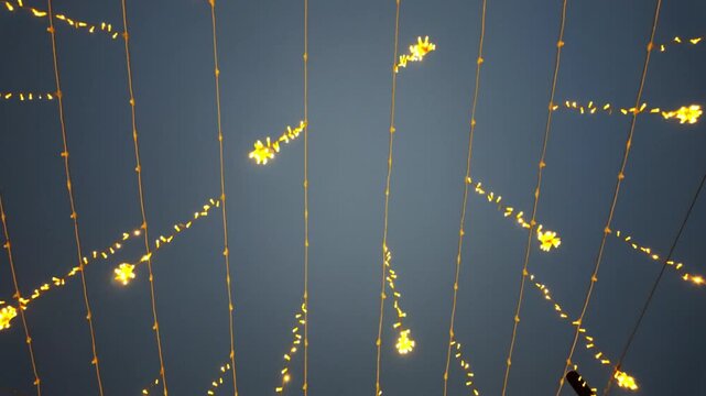 Upward Grid Of Sparkling Lights Against Deep Sky, Geometric Arrangement Of Glowing Dots And Lines Creates Starry Abstract Pattern, Slow Sway And Gentle Motion Evoke Meditative And Artistic Atmosphere