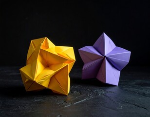 Two geometric paper stars, one yellow and one purple, against a dark backdrop