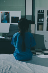 A patient with depression looks outside.