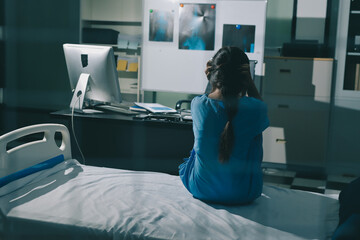 A patient with depression looks outside.