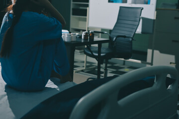 A patient with depression looks outside.