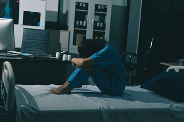 A patient with depression looks outside.