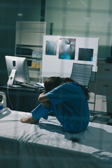 A patient with depression looks outside.