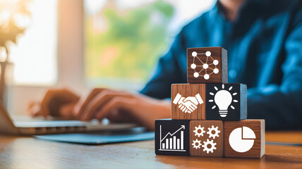 Navigating strategic business development with conceptual wooden blocks illustrating innovation, collaboration, data analysis, and technology integration for growth and success in a modern workspace
