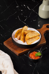 Tacos on Wooden Board with Salsa.