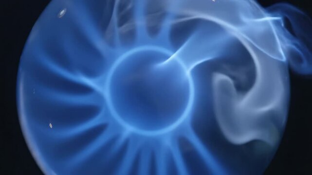 Extreme slow motion macro view revealing liquid blue fire and vapor elegantly swirling within a transparent glass sphere liquid blue fire, swirling, macro view