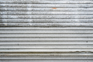  Sheet of ribbed galvanized metal for building structures.