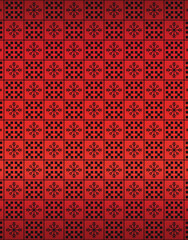 Red winter geometric pattern with snowflakes and checkered squares