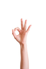 Human hand making the OK gesture on a white background