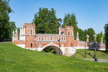 View of the ancient Figured Bridge on a sunny summer day. Tsaritsyno park. Moscow, Russia
