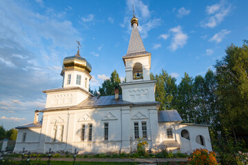 The ancient Church of All Saints (1849-1856) in the Verkhnechusovskaya Trifonova Pustyn on a sunny August evening. Krasnaya Gorka (Verkhnechusovskie Gorodki). Perm Krai, Russia