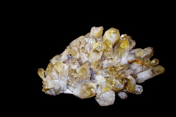 Rhinestone with white and yellow crystals on a dark background. Gems, mineralogy, jewelry.