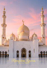Majestic mosque at sunset with Ramadan Kareem greeting