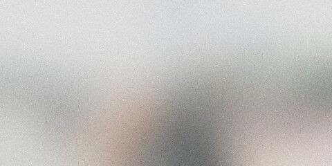 Grainy textured background with subtle gradient effect in muted silver and pastel tones