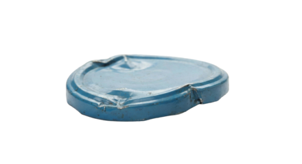 Crushed blue metal lid isolated on white background. Damaged jar or canning lid with dents and bends, shown close-up for packaging, recycling, or waste concept visuals.