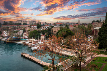 Naklejka premium Ships in the old harbour in Antalya (Kaleici), Turkey. Old town of Antalya is a popular Tourist destination in Turkey.