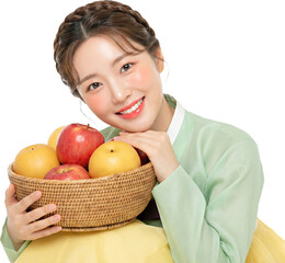 Beautiful Young Korean Woman in Hanbok Holding a Basket of Apples and Pears