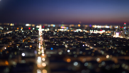 Glimmering City Lights at Twilight, Abstract Bokeh View of Urban Nightlife and Metropolitan Energy with Soft Focus and Golden Glow