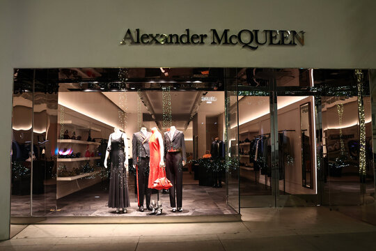 Beverly Hills, California &ndash; November 30, 2025: ALEXANDER MCQUEEN luxury fashion boutique by night on Rodeo Drive, Beverly Hills