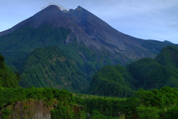 Fototapeta premium Mount Merapi or Gunung Merapi is an active stratovolcano located on the border between Central Java and Yogyakarta provinces, Indonesian.