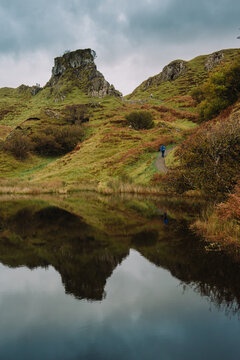 A magical and ethereal landscape photograph of the Fairy Glen (Bail nan Cnoc) near Uig on the Isle of Skye. The image features the iconic basalt outcrop known as Castle Ewen, which resembles a ruined 