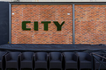3d Green Grass Sign City at Brick Wall Contrast Decor