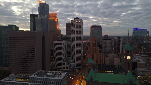 Soft twilight over downtown Minneapolis, summer city aerial view.