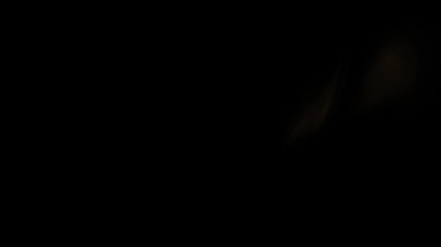 Real Shooted Cinematic Lens Flare Overlay on Black Background at 1000fps Slow Motion.