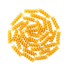 Vibrant fusilli pasta arranged in circular pattern on black