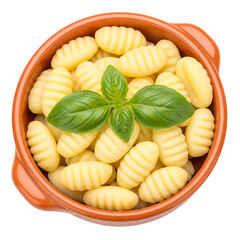 Delicious gnocchi in a bowl with basil leaves on top